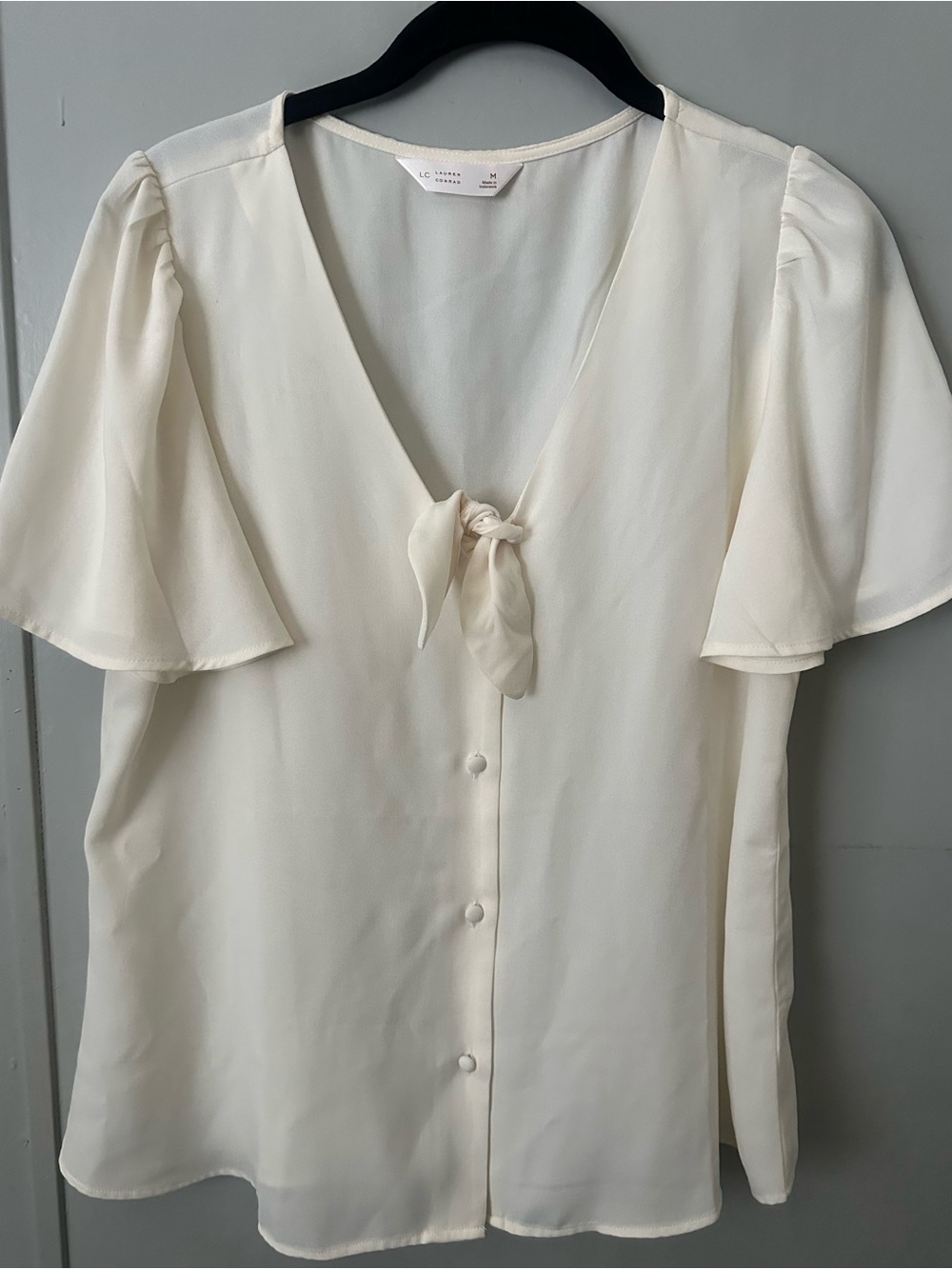 LC Cream colored blouse with tie front bow